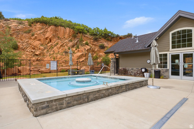 3355 Santa Fe Road Park City, UT 84098 - Photo 44 of 45 Outdoor water feature with stone-look surround and concrete coping