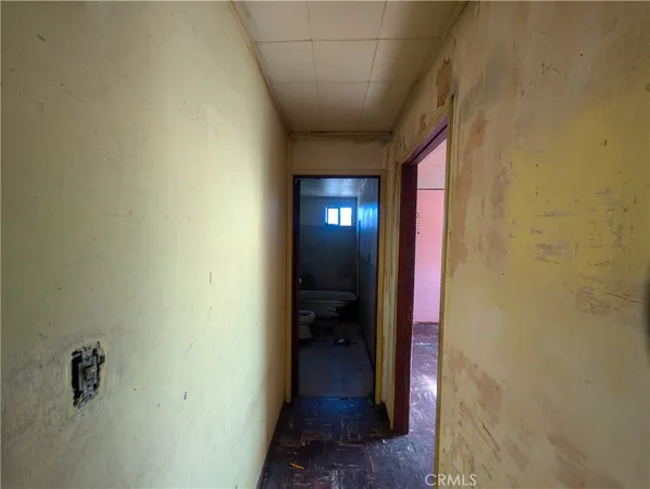 a view of an empty room and window