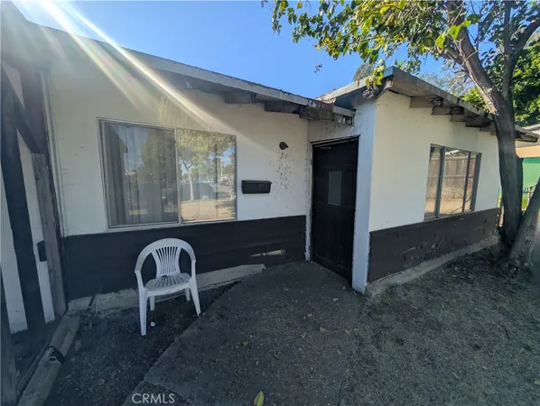 a front view of a house with patio