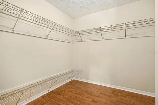 a view of a room with racks on the wall
