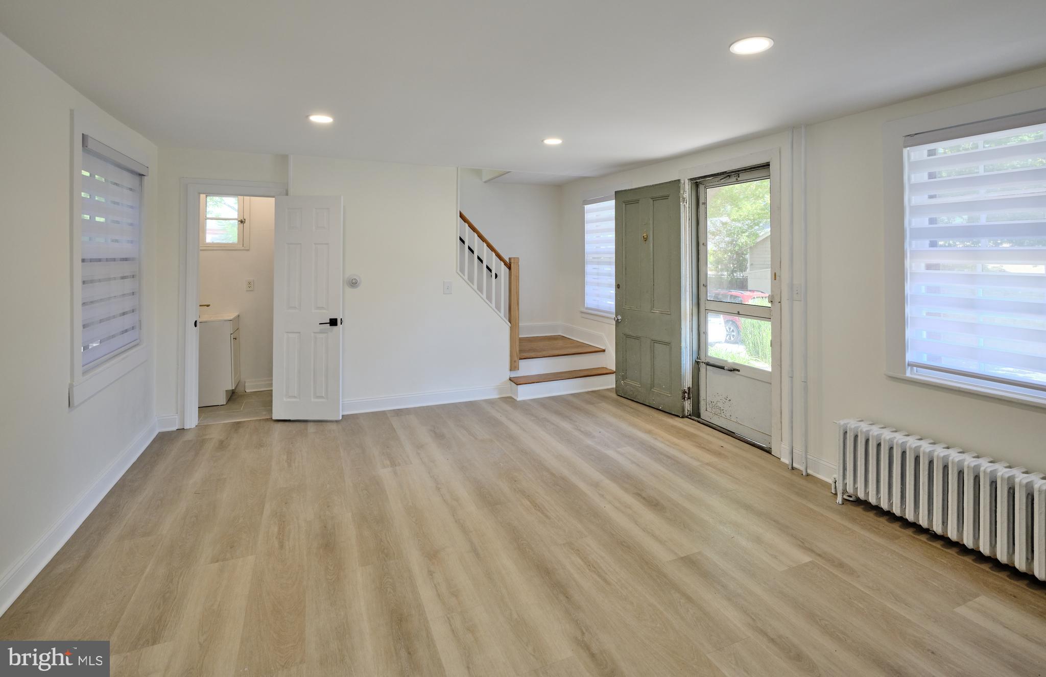 14 West Bridge Street, Unit A New Hope, PA 18938 - Photo 7 of 20 a view of empty room with wooden floor and fan