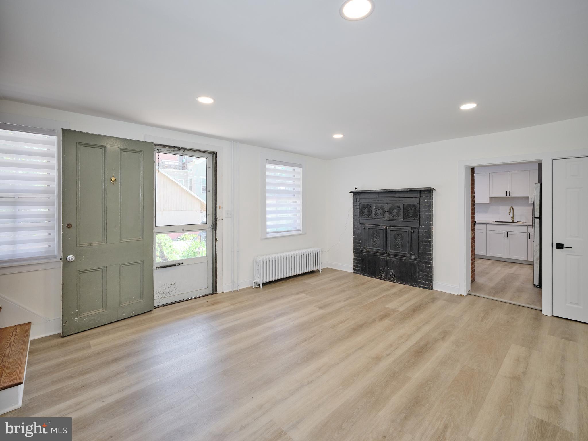 14 West Bridge Street, Unit A New Hope, PA 18938 - Photo 7 of 24 an empty room with windows and cabinet
