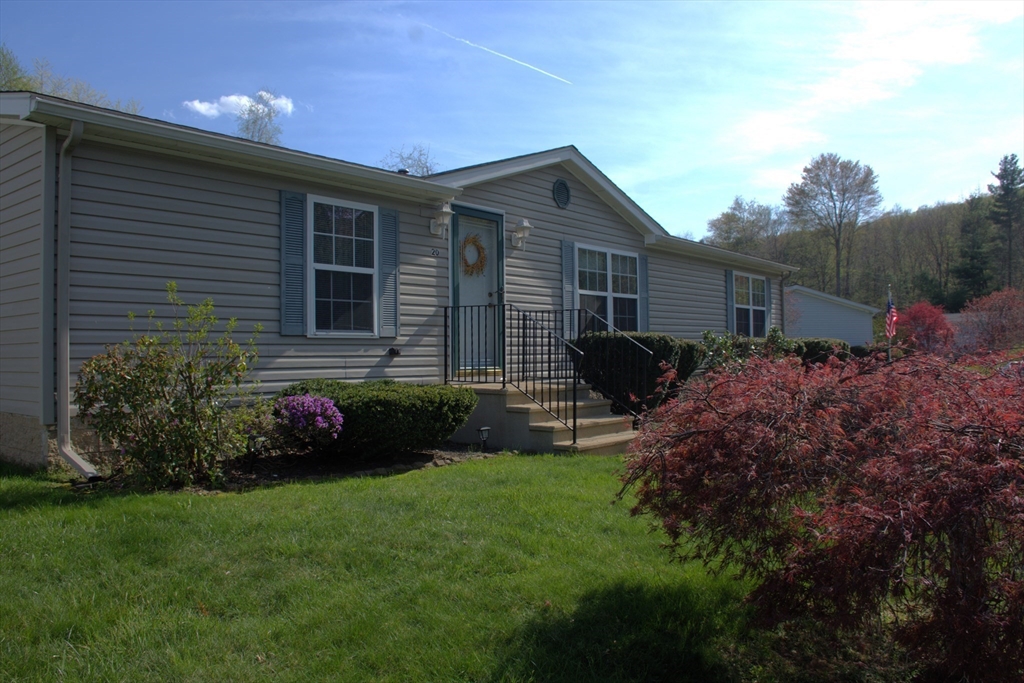 20 Deer Run Brookfield, MA 01506 - Photo 2 of 29 a view of a house with a garden