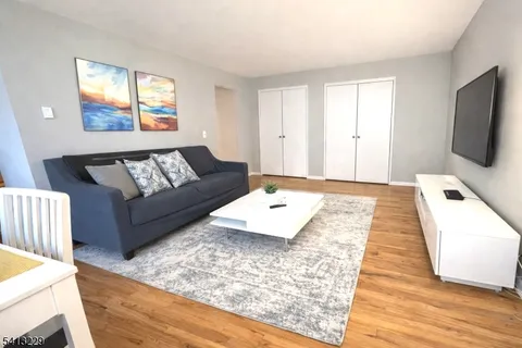 a living room with a couch and a table