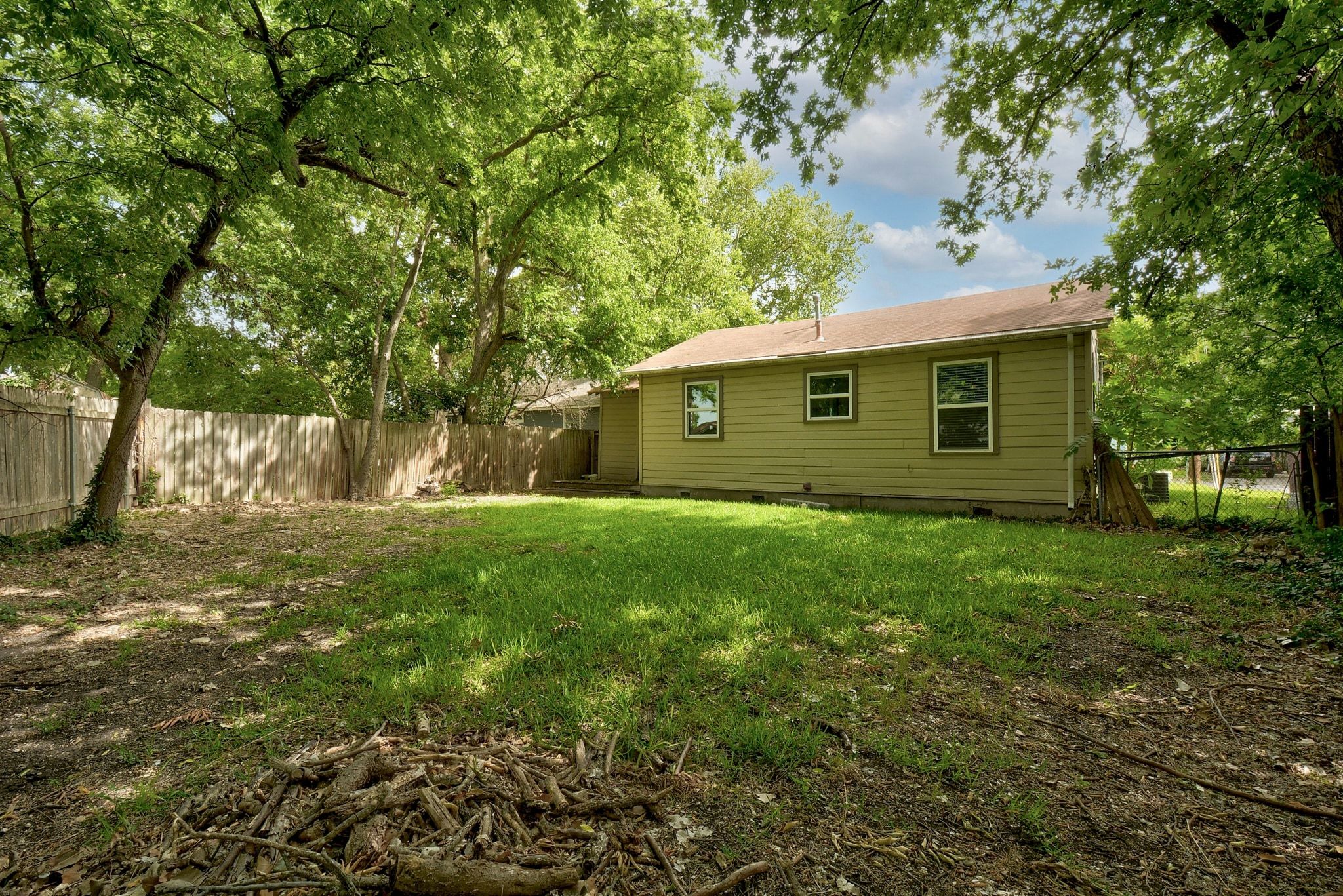 907 East 56th Street Austin, TX 78751 - Photo 19 of 20 a view of a backyard with a garden