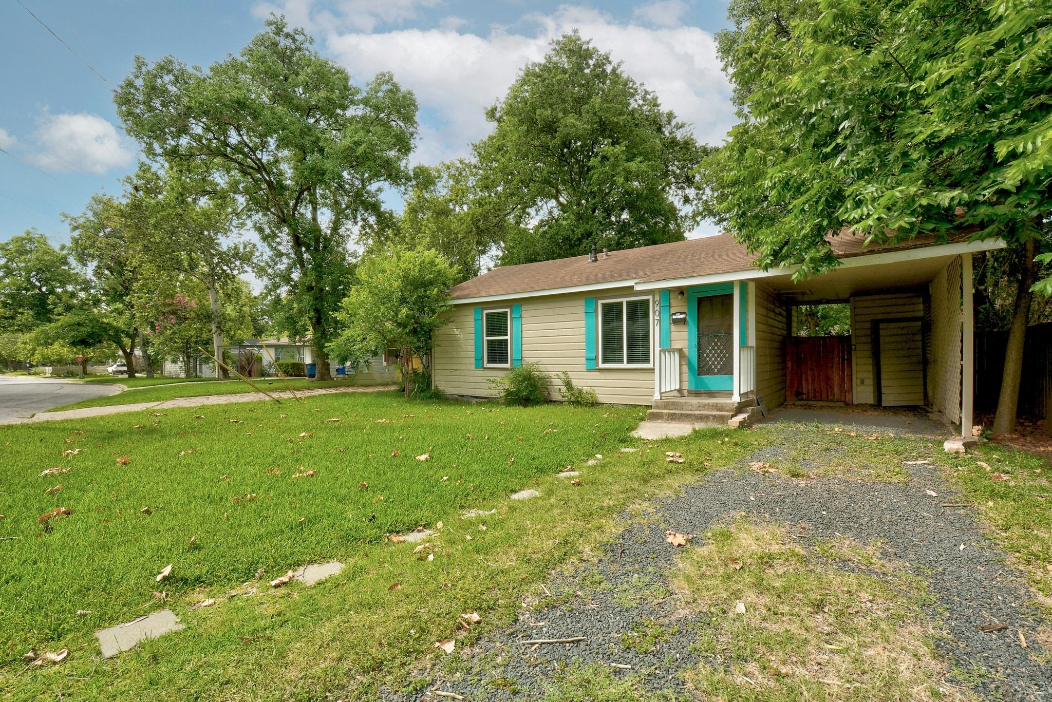 907 East 56th Street Austin, TX 78751 - Photo 3 of 20 a view of a house with a backyard