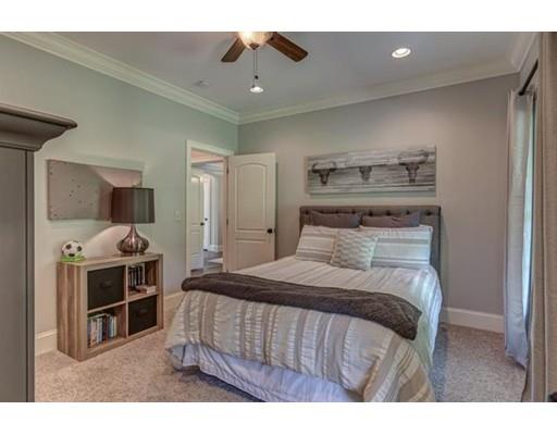 351 East Monomonac Road Rindge, NH 03461 - Photo 17 of 25 a bedroom with a bed and a television