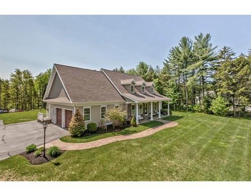 351 East Monomonac Road Rindge, NH 03461 - Photo 2 of 25 a front view of a house with a garden
