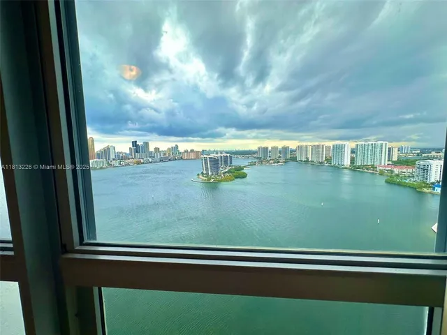 a view of a lake from a window