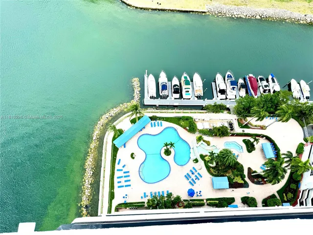 a bathroom with a sink mirror and window