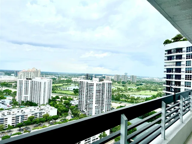 a view of a balcony with city view