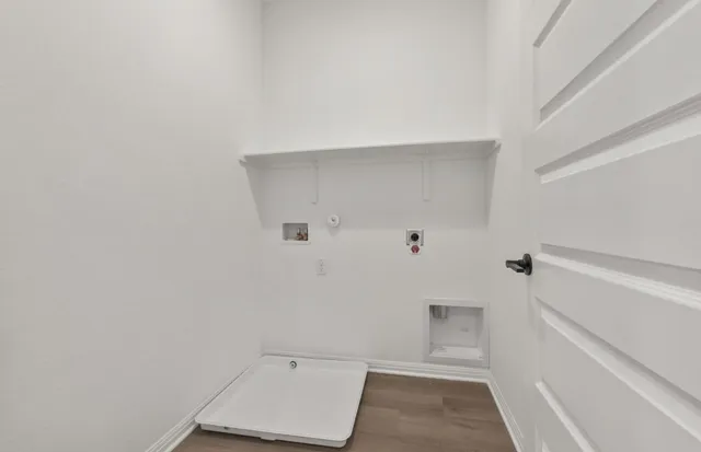 a bathroom with a sink toilet and a mirror