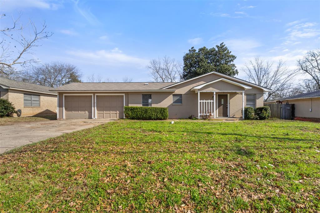 3126 Colgate Avenue Tyler, TX 75701 - Photo 2 of 33 a front view of a house with a yard