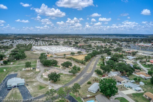1221 Forest Road Sebring, FL 33872 - Photo 2 of 31 a view of a lake with a forest