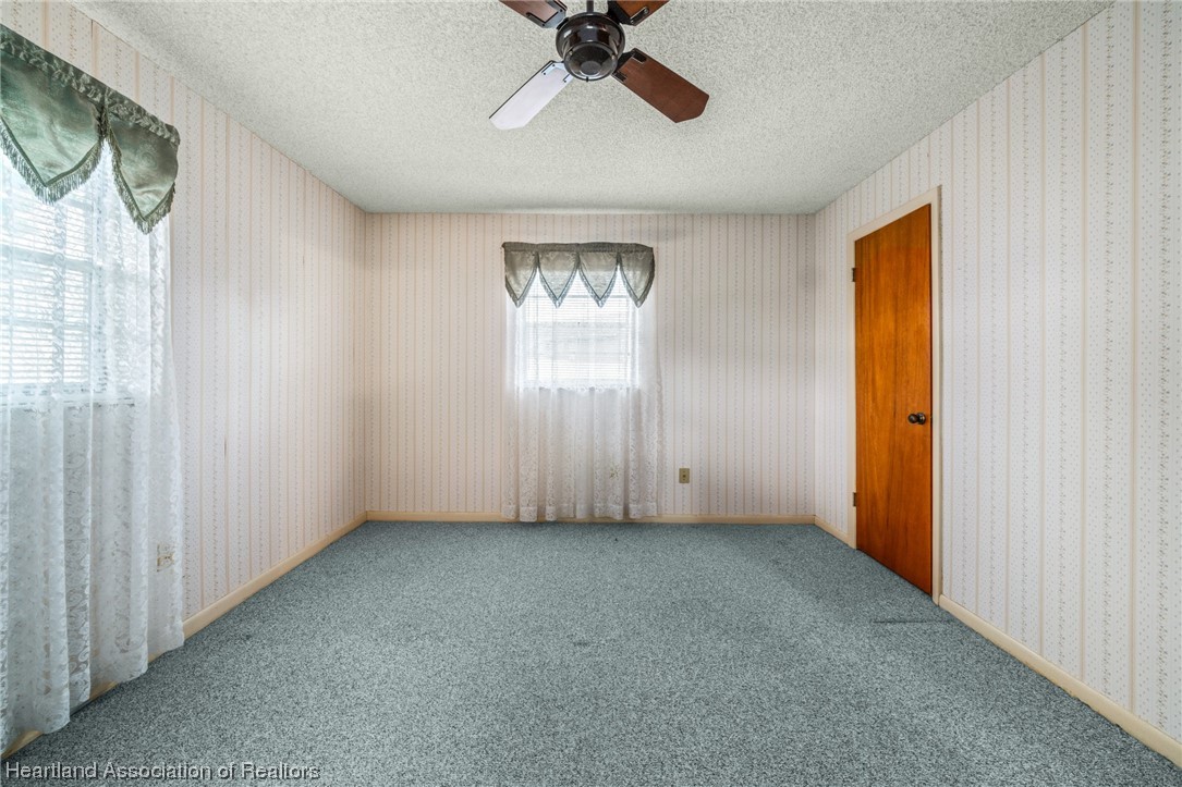 1221 Forest Road Sebring, FL 33872 - Photo 24 of 31 a view of an empty room with a window
