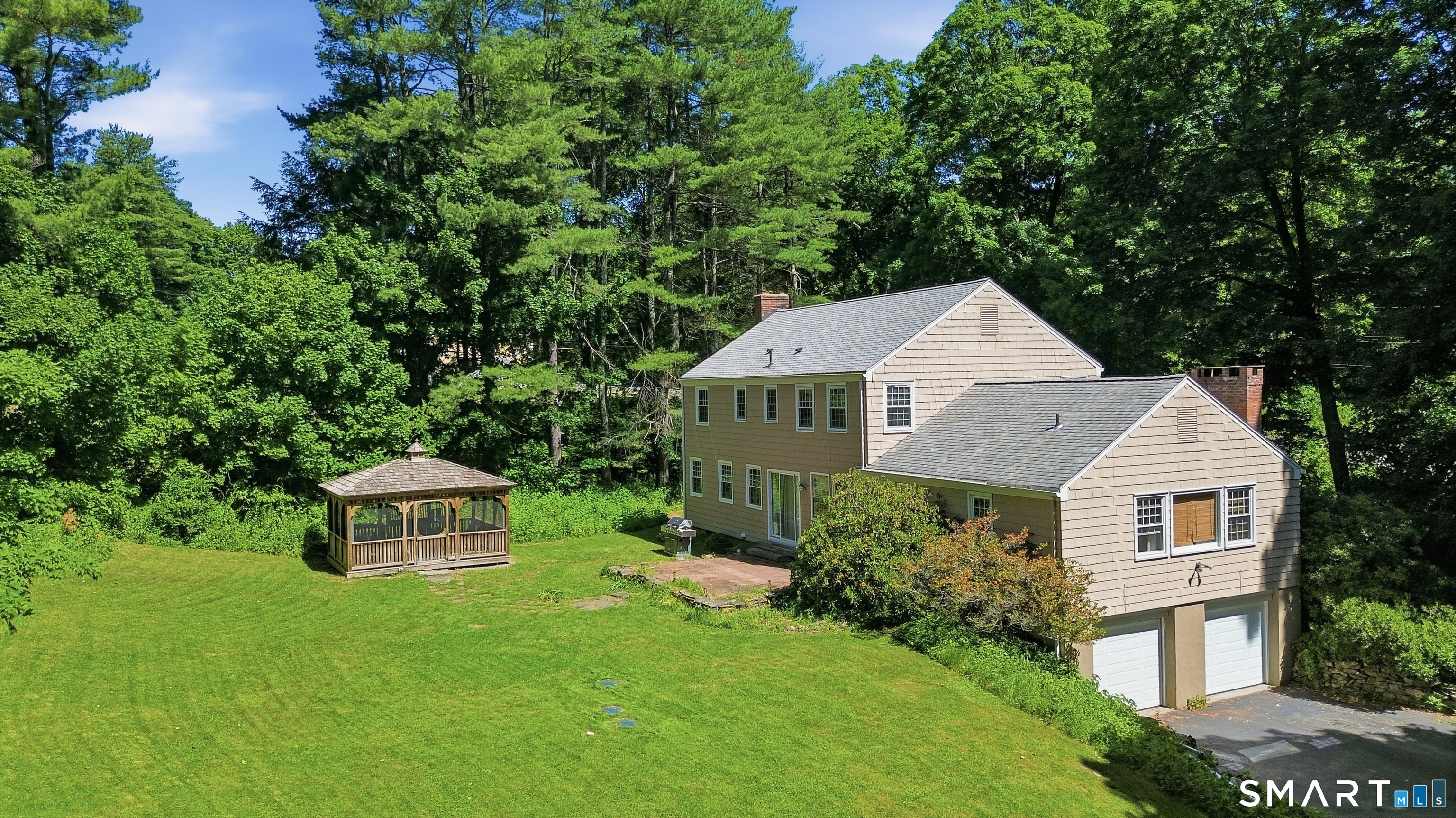 47 Westledge Road Simsbury, CT 06092 - Photo 33 of 38 Private backyard with gazebo.