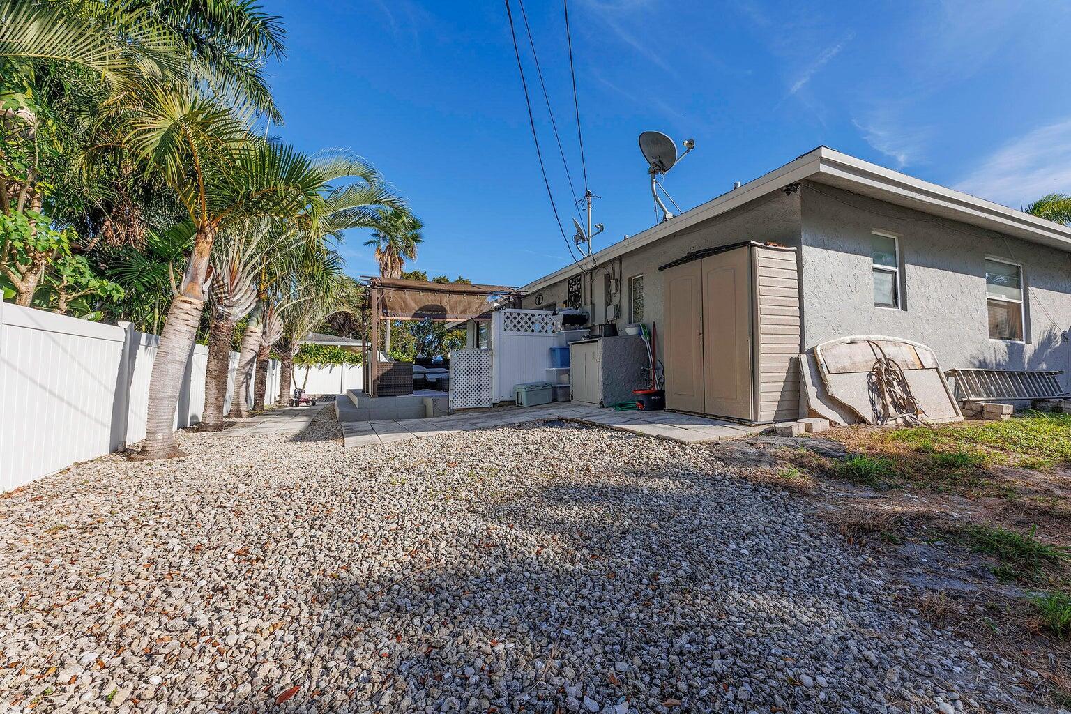 2935 Lake Worth Road Palm Springs, FL 33461 - Photo 21 of 22 backyard view 1