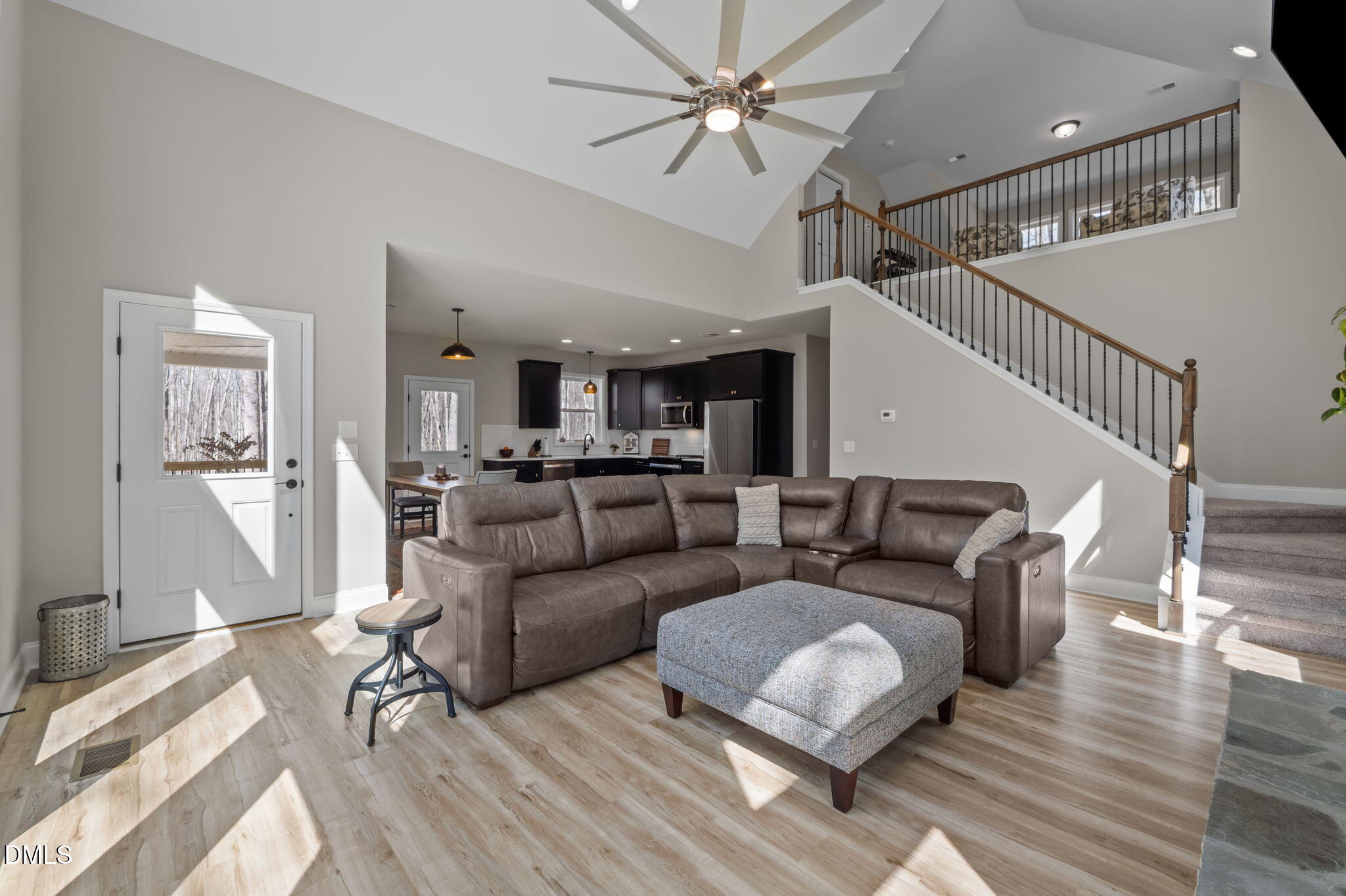 8514 Charlie Stovall Road Roxboro, NC 27574 - Photo 20 of 48 a living room with furniture and wooden floor