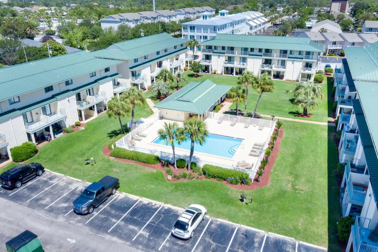 60 Sandprints Drive, Unit E3 Miramar Beach, FL 32550 - Photo 18 of 26 an aerial view of multiple houses with yard