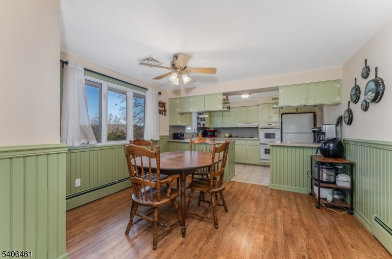 224 Bellis Road Milford, NJ 08848 - Photo 11 of 25 a view of a dining room with furniture and wooden floor