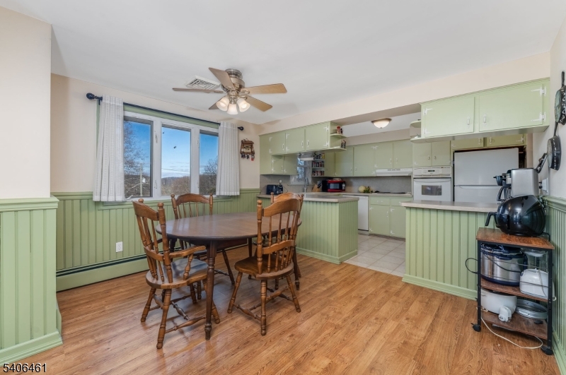 224 Bellis Road Milford, NJ 08848 - Photo 12 of 25 a view of a dining room with furniture and wooden floor