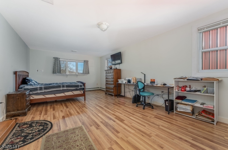 224 Bellis Road Milford, NJ 08848 - Photo 16 of 25 a living room with furniture and a wooden floor