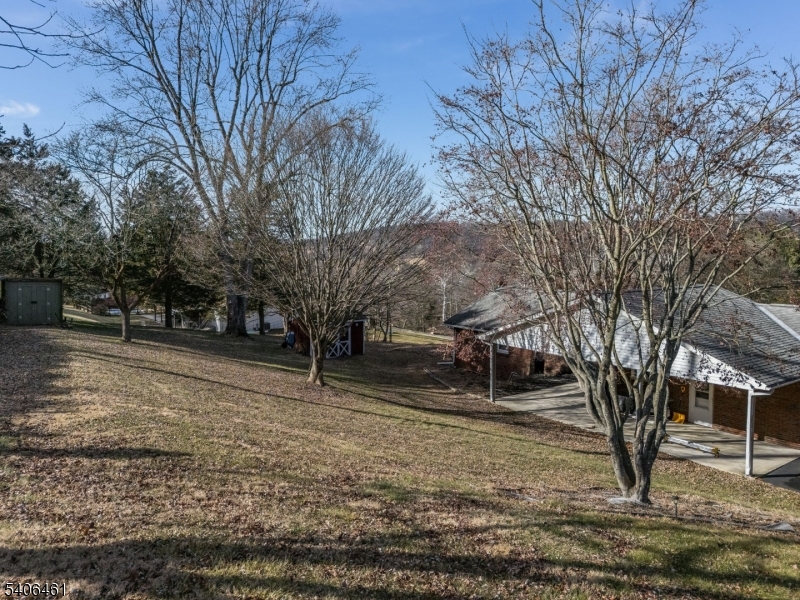 224 Bellis Road Milford, NJ 08848 - Photo 7 of 25 a house with trees in front of it
