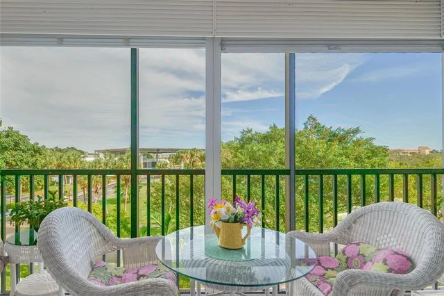 a kitchen with stainless steel appliances granite countertop a refrigerator and a stove