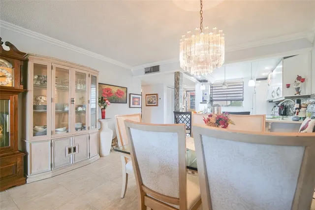 a bedroom with furniture and a large window