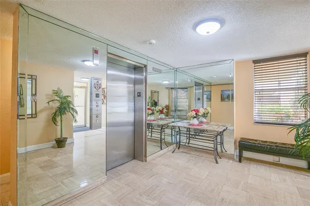 a black and white photo of a living room