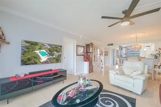a view of a dining room with furniture window and natural light