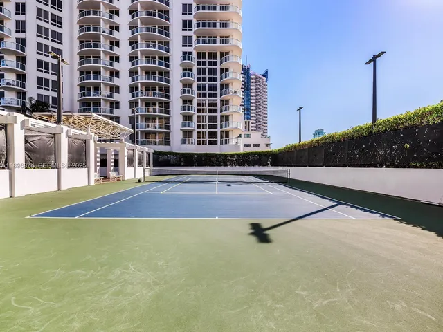 a view of patio with a table chairs and a patio