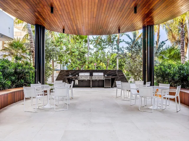 a view of a patio with swimming pool