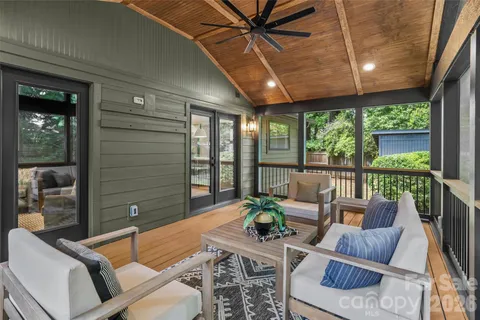 a outdoor living space with furniture and garden view
