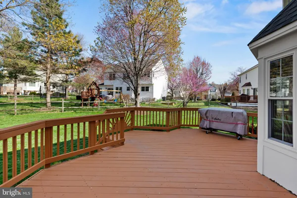 a view of a deck with a yard