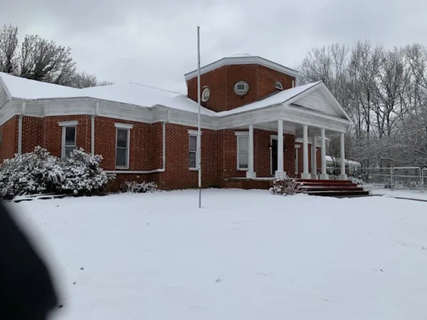 a front view of house with yard