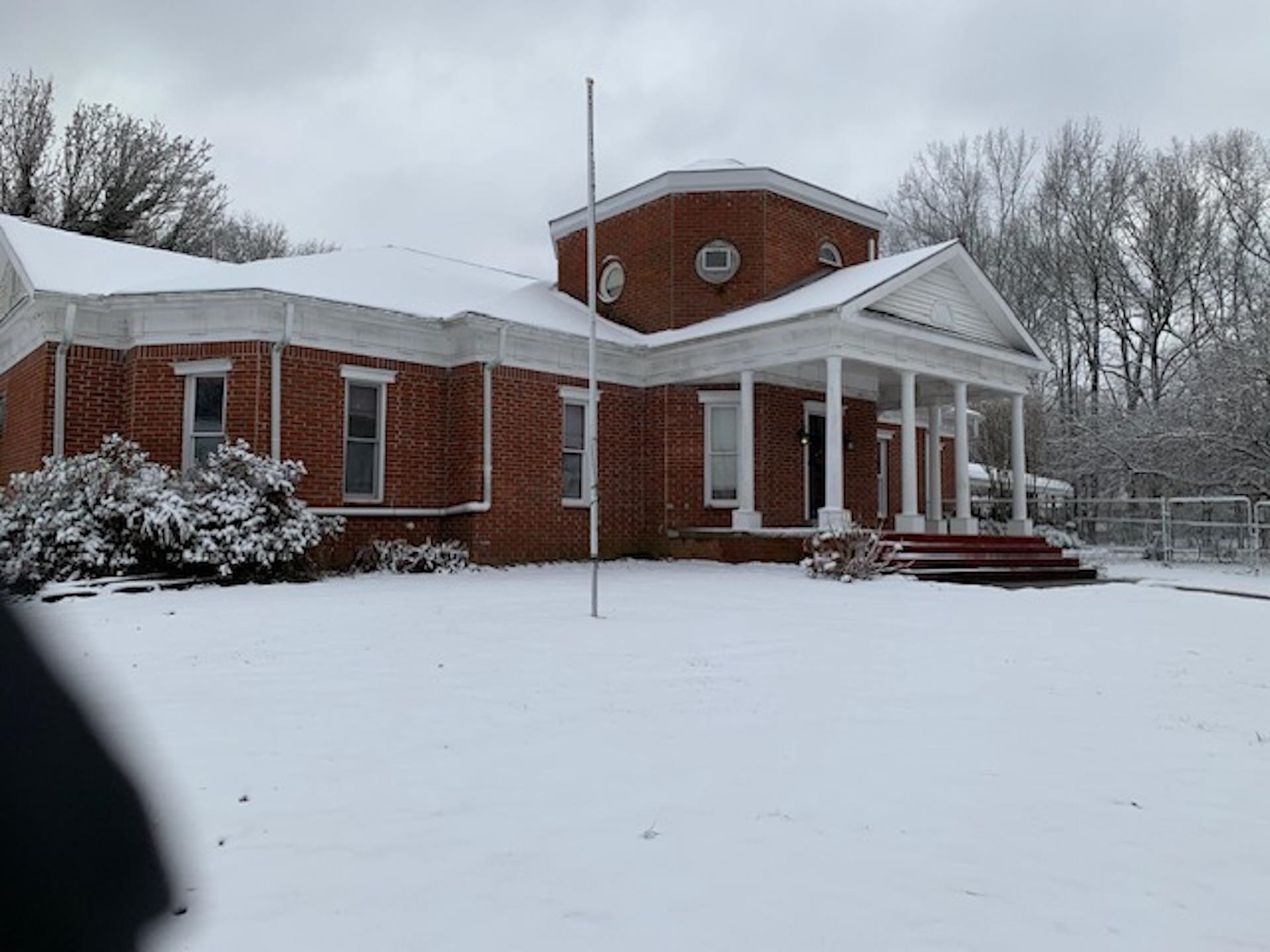 a front view of house with yard