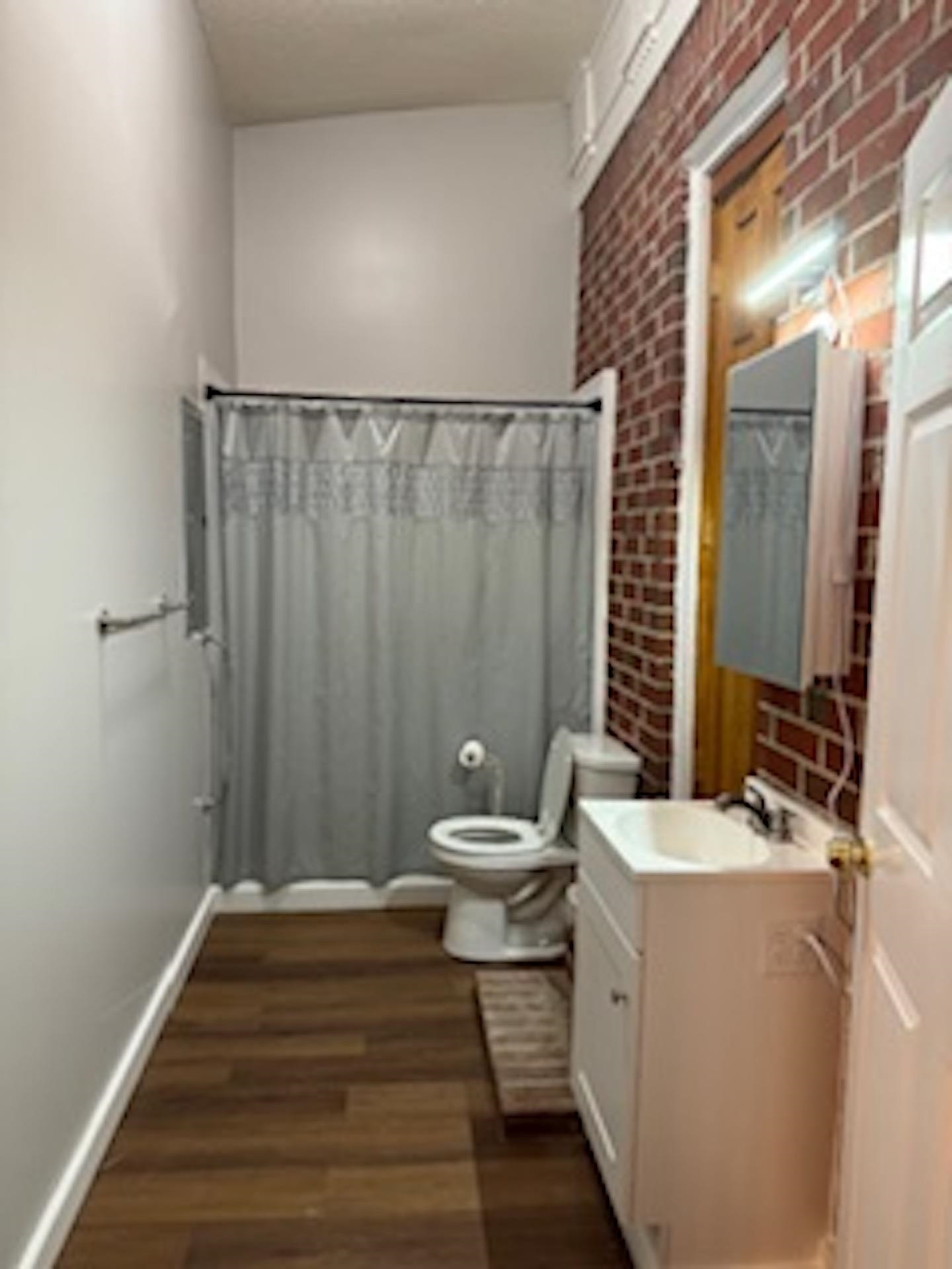 4500 New Brownsville Road Memphis, TN 38135 - Photo 21 of 23 a bathroom with a sink a toilet and shower