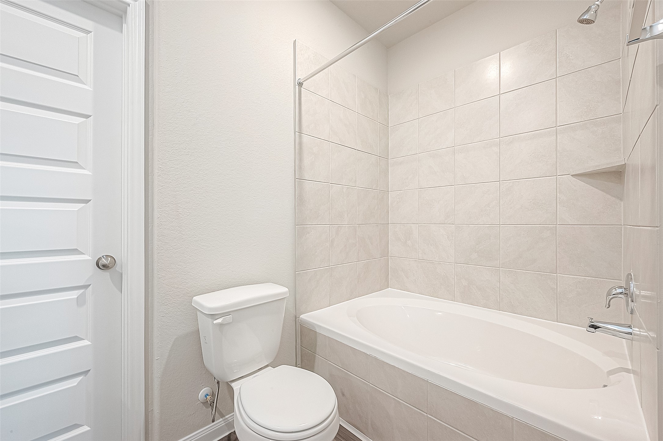 4923 Luke Matthew Drive Rosharon, TX 77583 - Photo 27 of 48 a white toilet sitting next to a bath tub