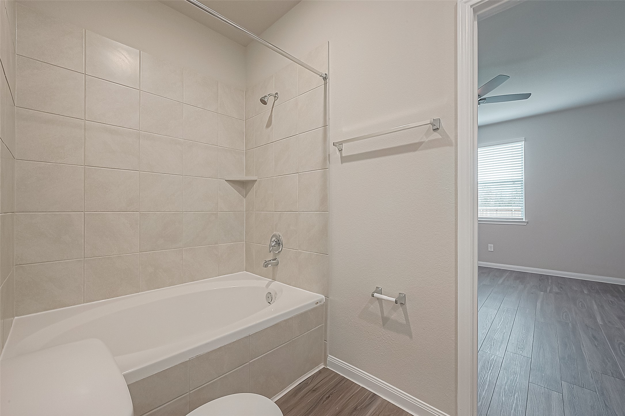 4923 Luke Matthew Drive Rosharon, TX 77583 - Photo 29 of 48 a bathroom with a bathtub and shower