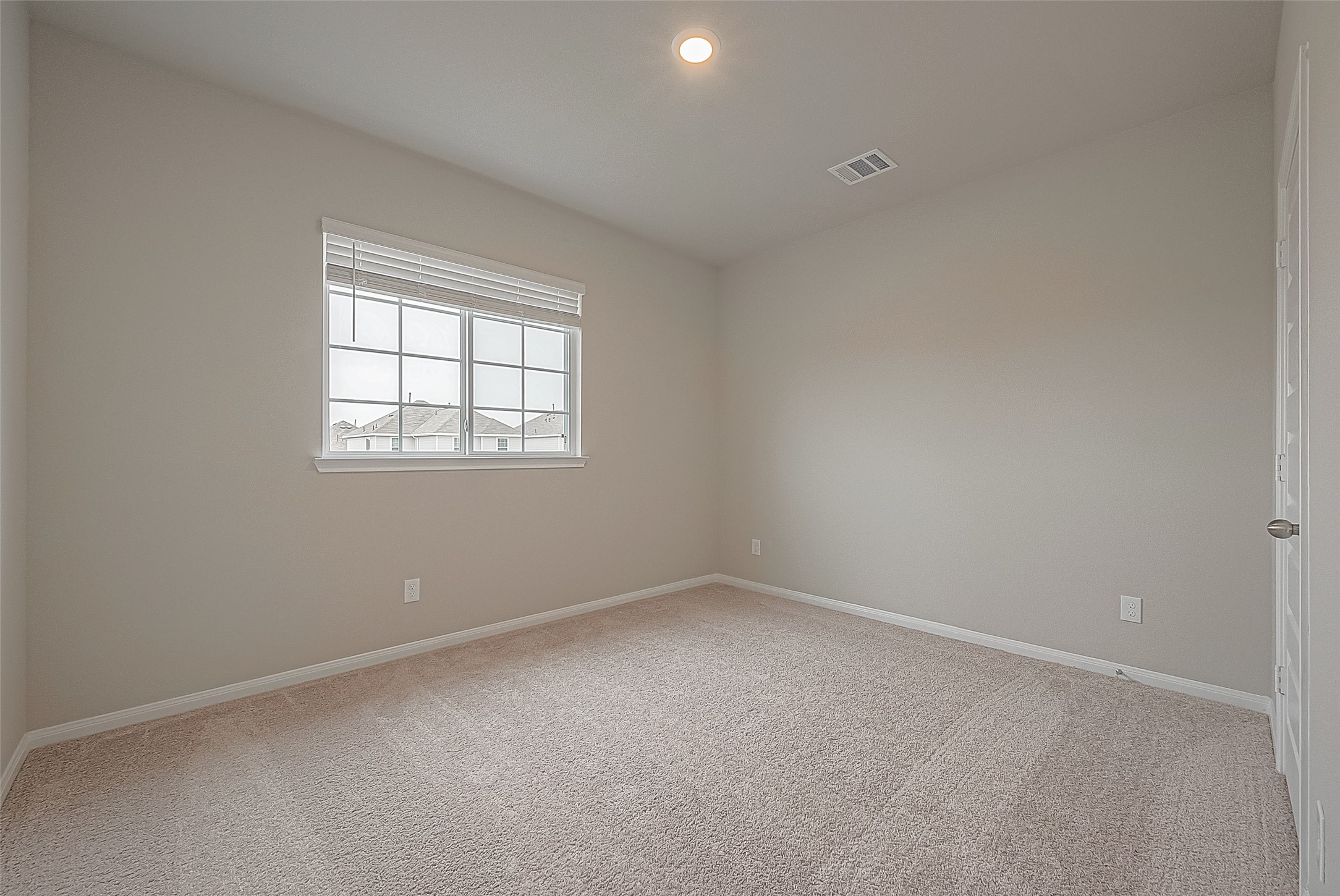 4923 Luke Matthew Drive Rosharon, TX 77583 - Photo 31 of 48 an empty room with a window