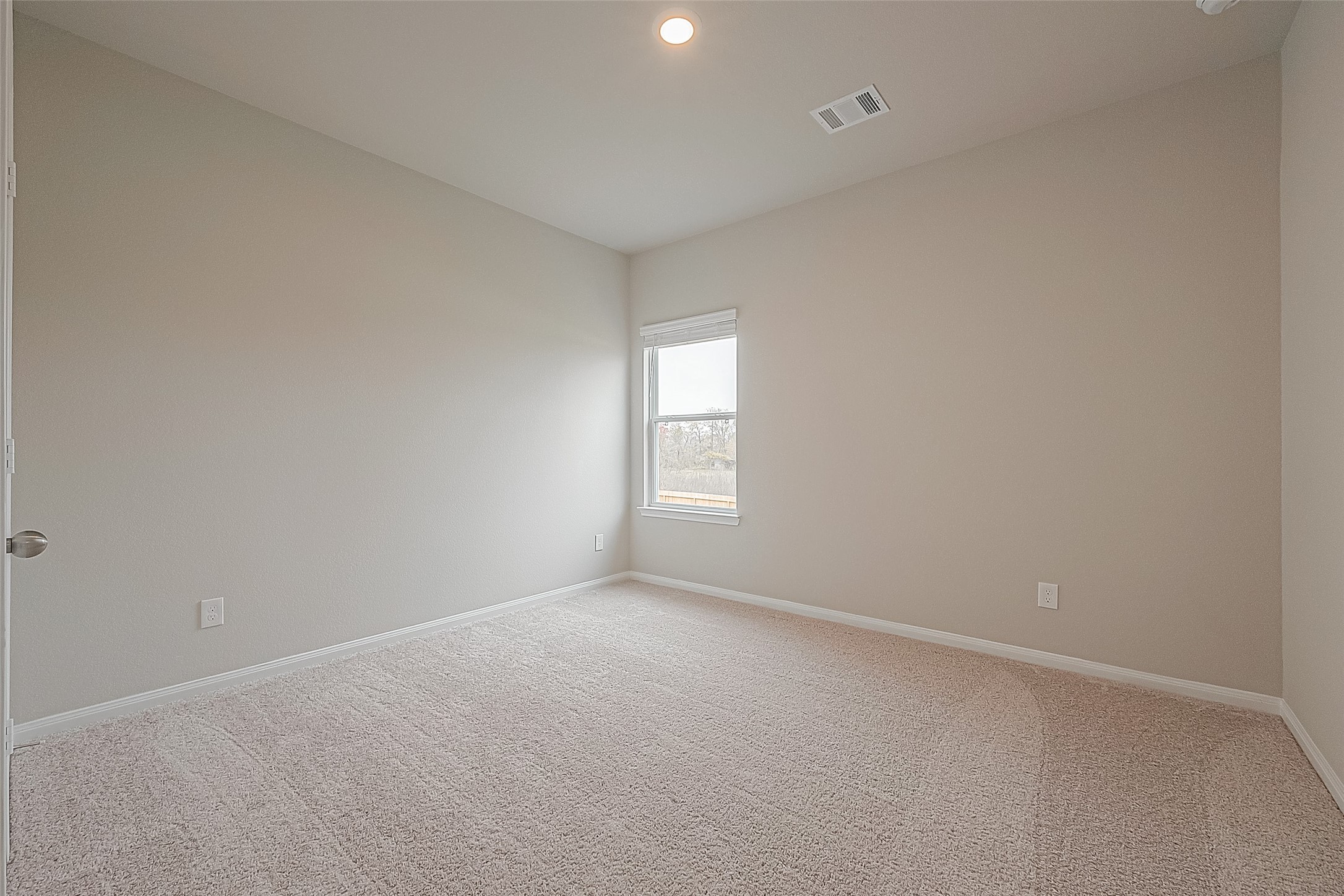 4923 Luke Matthew Drive Rosharon, TX 77583 - Photo 35 of 48 an empty room with a window