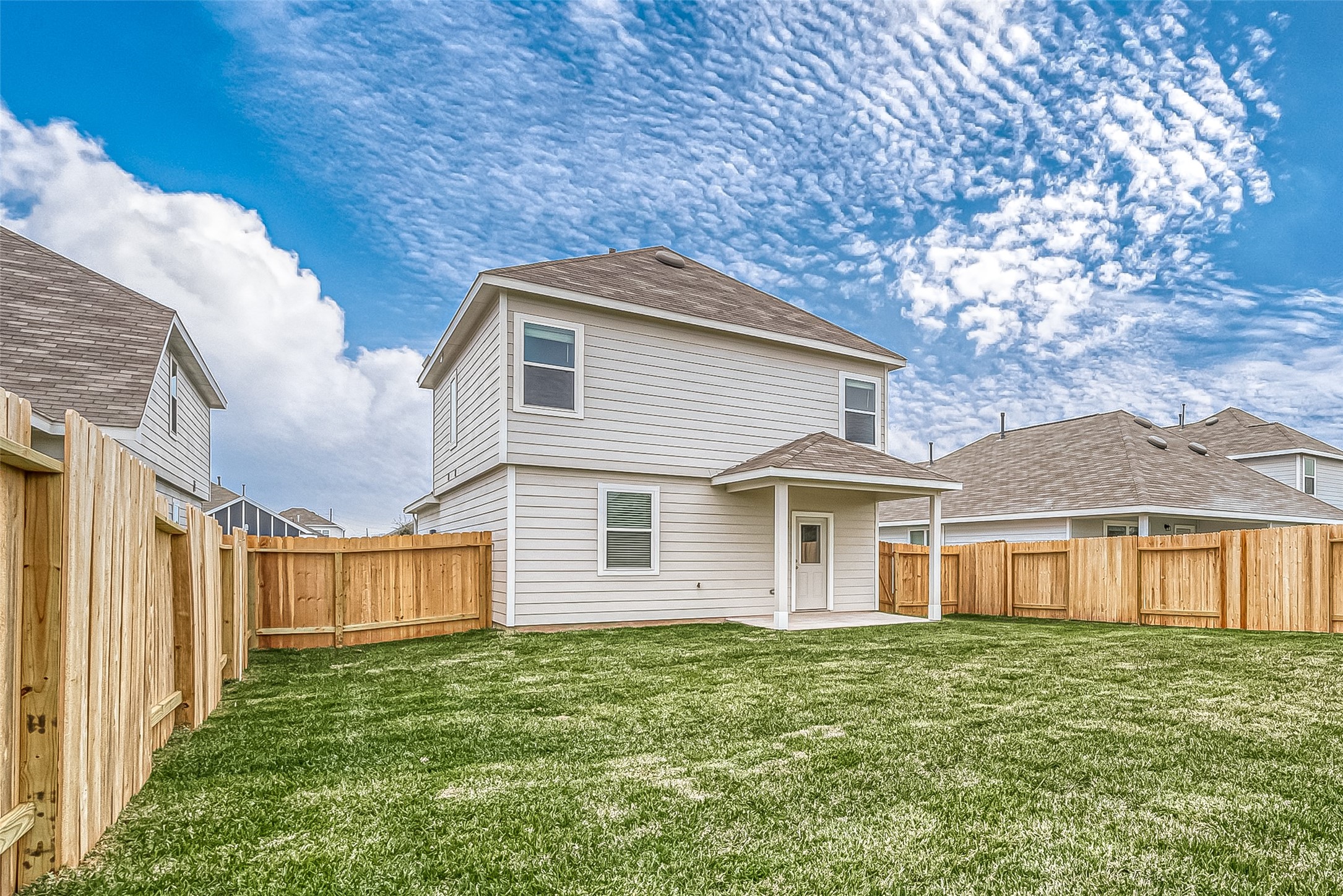 4923 Luke Matthew Drive Rosharon, TX 77583 - Photo 44 of 48 a view of a house with a backyard