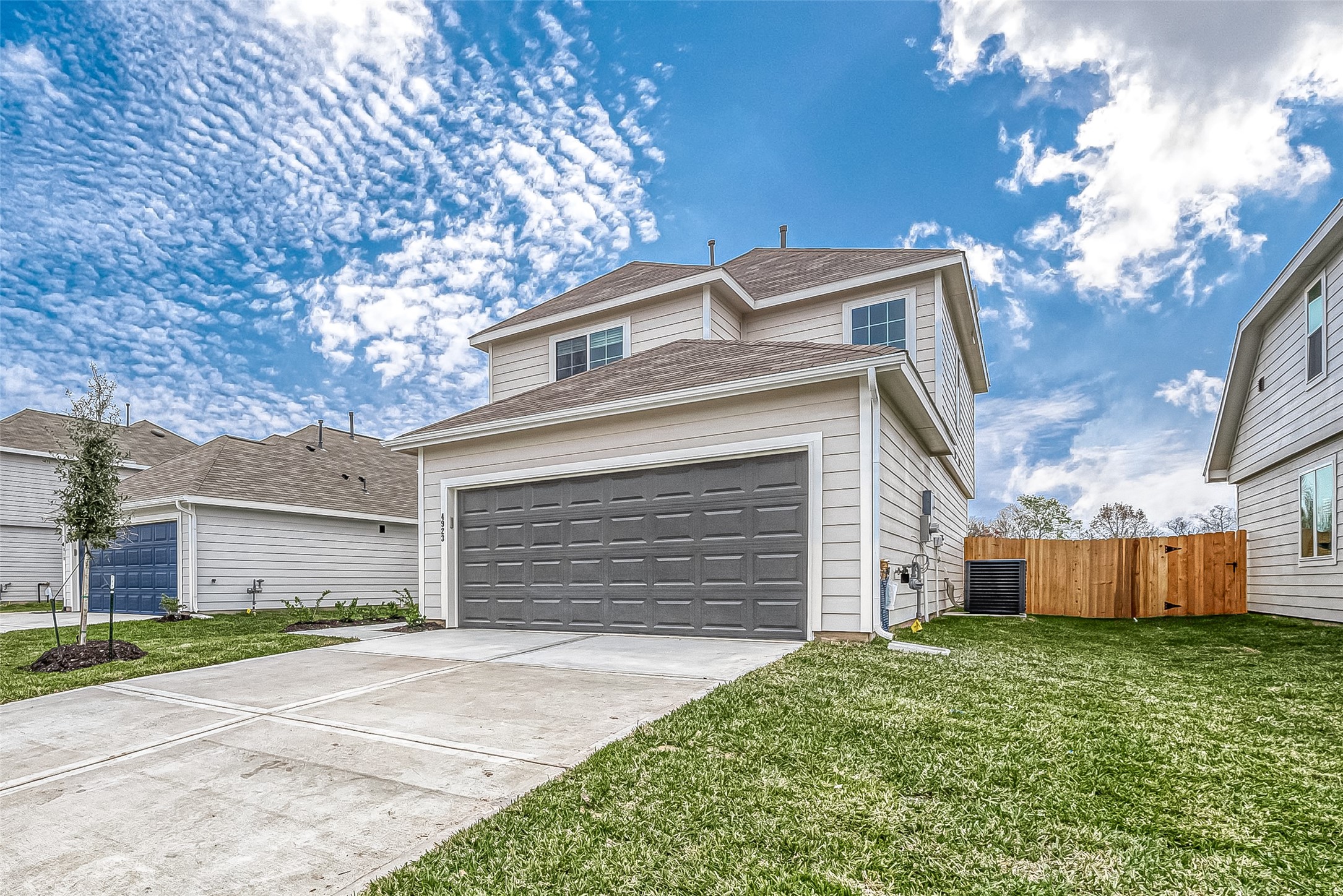 4923 Luke Matthew Drive Rosharon, TX 77583 - Photo 6 of 48 a front view of a house with a yard