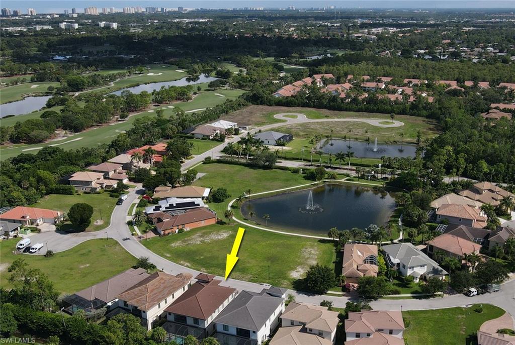 2875 Coco Lakes Drive Naples, FL 34105 - Photo 26 of 27 Birds eye view of property with a water view