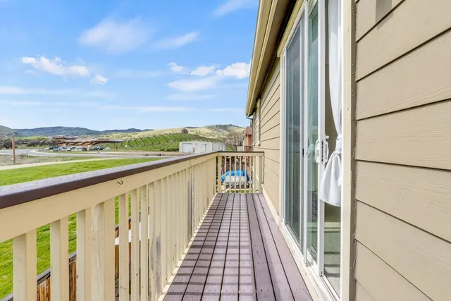 a view of a balcony with city view
