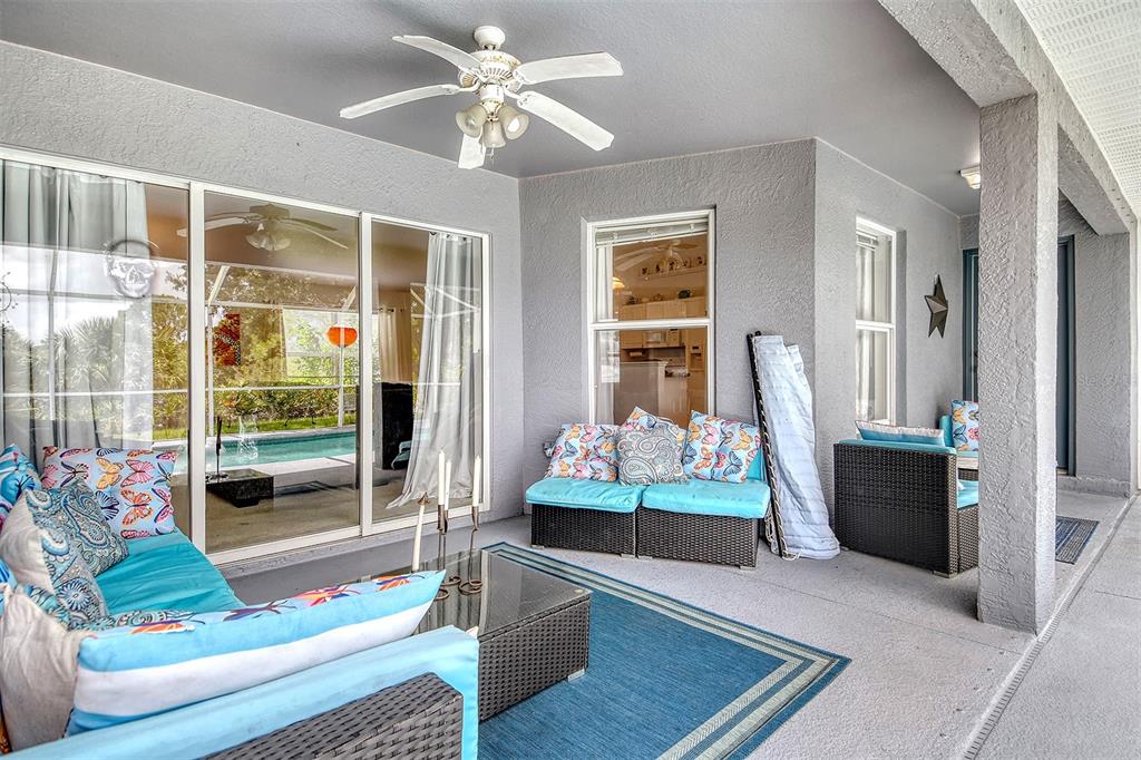 2276 Polaris Road North Port, FL 34291 - Photo 26 of 31 a living room with furniture and a gate