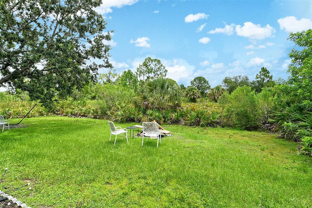 2276 Polaris Road North Port, FL 34291 - Photo 30 of 31 a view of a golf course with a tree