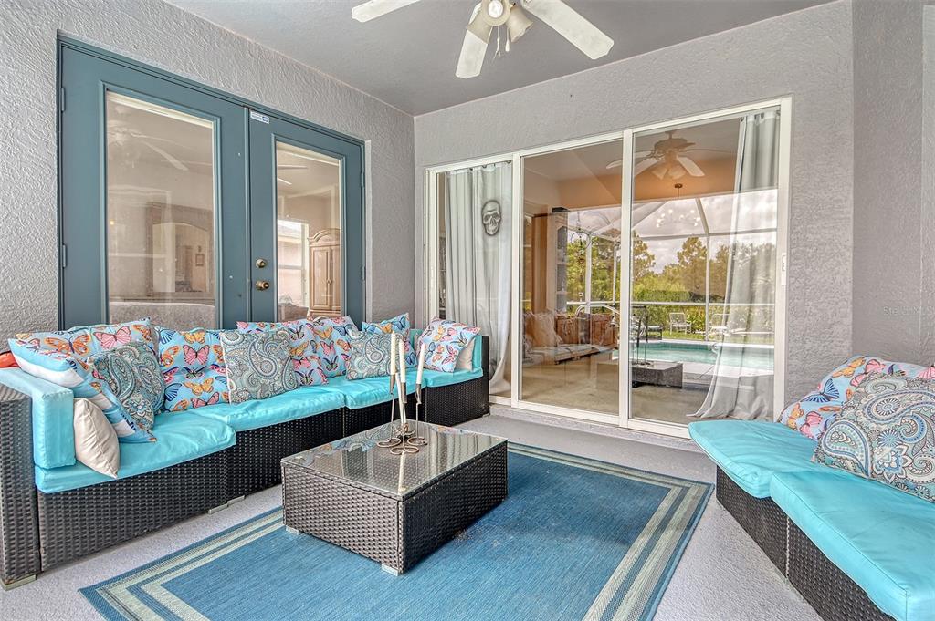 2276 Polaris Road North Port, FL 34291 - Photo 3 of 31 a living room with furniture and a large window