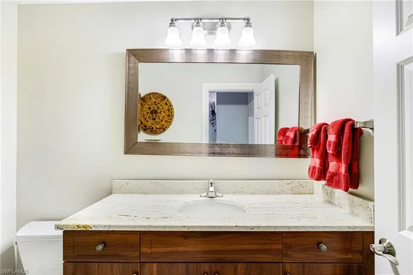 a view of a balcony with yard